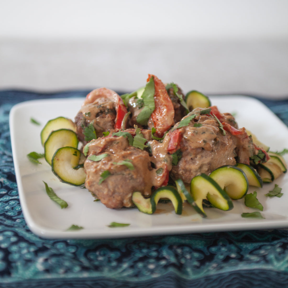 Pork Meatballs w/Zucchini, Bell Pepper & Sesame-Tahini-Almond Sauce
