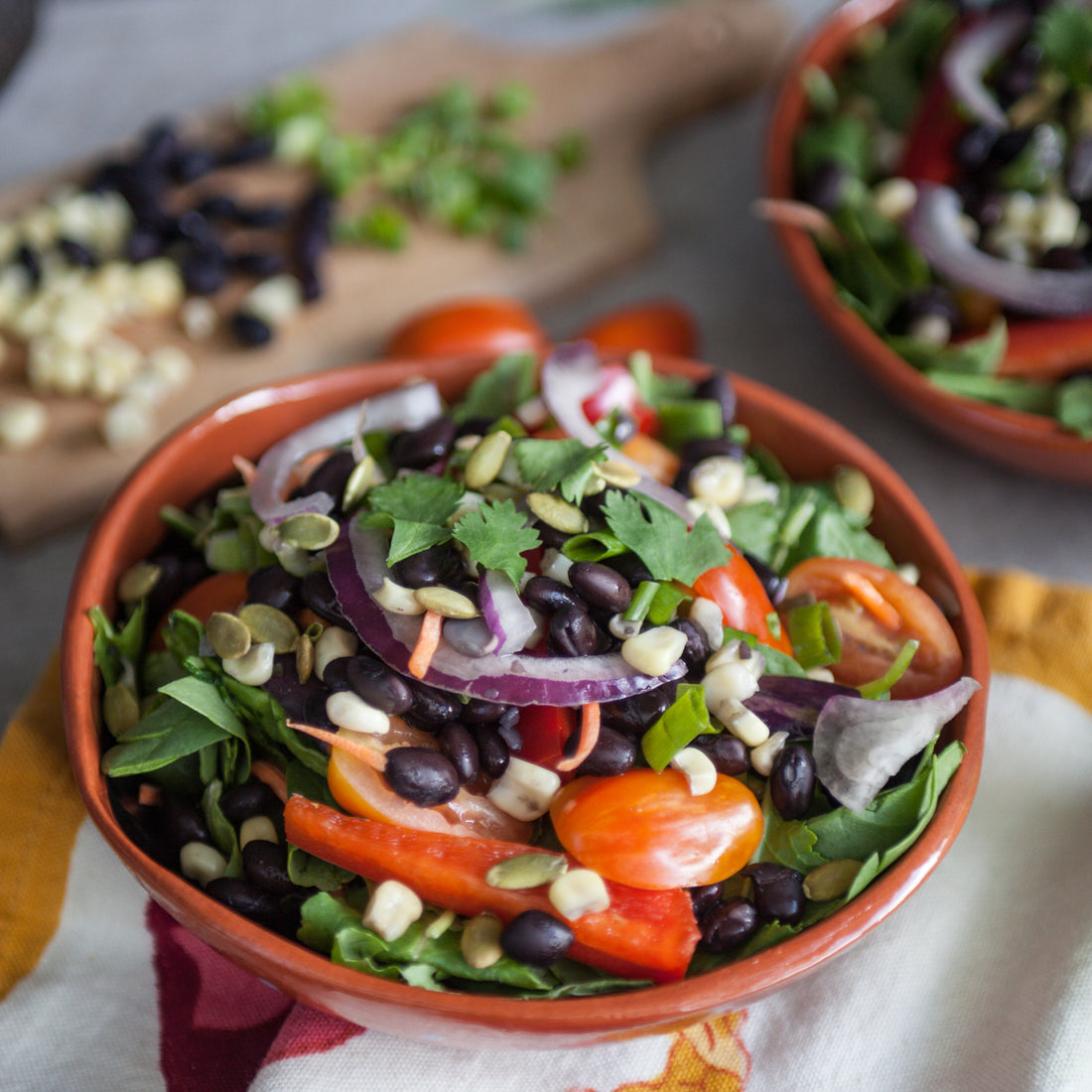 Mexican Chopped Salad w/Black Beans, Sweet Corn, Cherry Tomatoes, Spiced Pepitas and Lime-Avocado Dressing