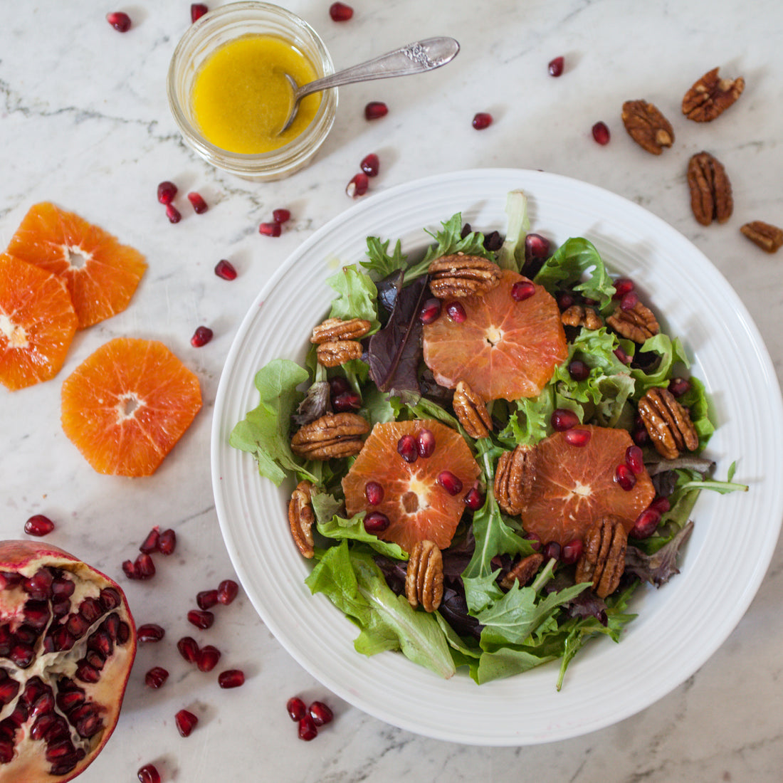 Green Salad w/Orange, Apple, Pomegranate, Feta, Toasted Pecans & Orange-Champagne Dressing