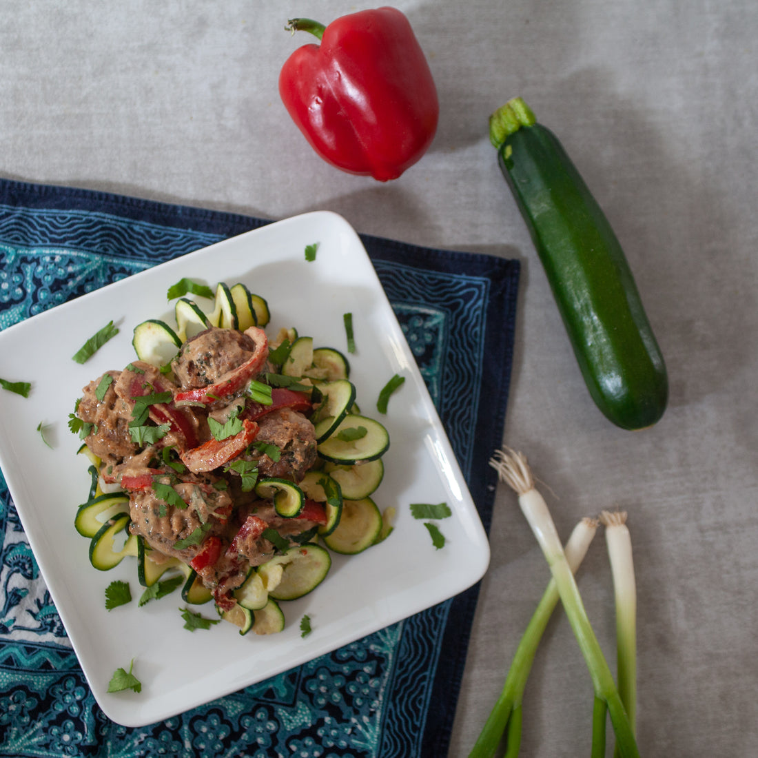 Pork Meatballs w/Zucchini, Bell Pepper & Sesame-Tahini-Almond Sauce